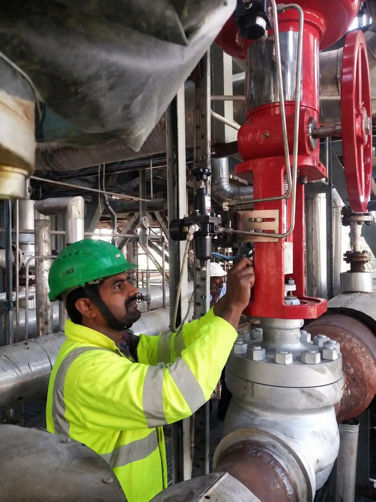 Technician performing an onsite valve health checkup